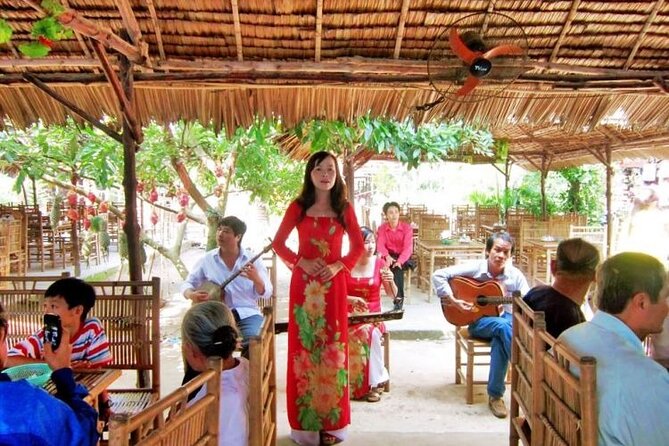 Adventure Cu Chi Tunnels and Mekong Delta Tour From HCM - Honey Tea, Fruit, Coconut Candy, and Live Southern Folk Music