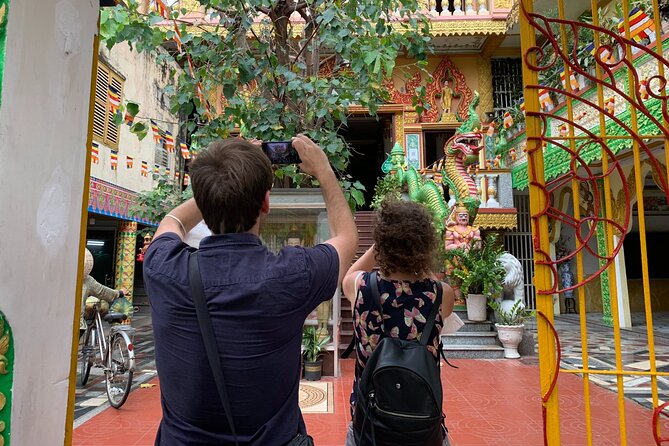 Boat tour on Mekong river see the sunset, small canal, Vegan dinner, street food - Pagoda visits: two quick temple stops with a calm pause