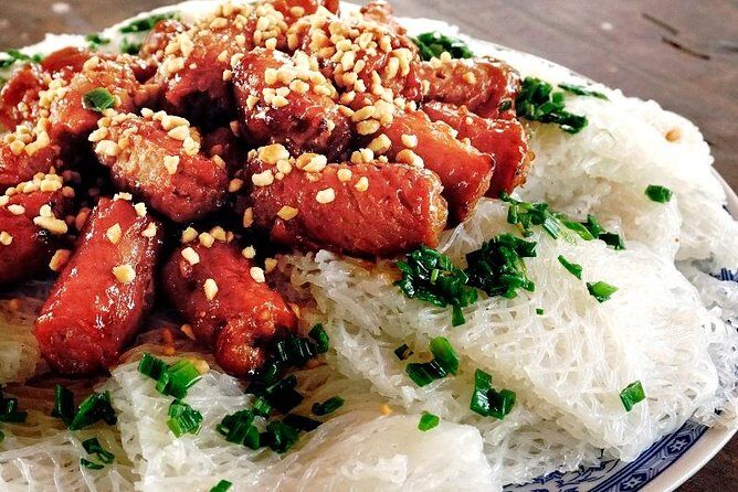 Can Tho food tour voted by local - Vegan option is available - Stop 2: Grilled Pork Rolls Wrapped in Rice Paper and House Sauce