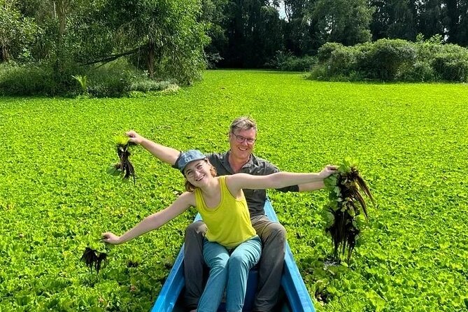 Discover Mua Xuan Nature Reserve - Cruising Lung Ngoc Hoang Wetlands: Water Hyacinths, Flooded Forest, and Birds