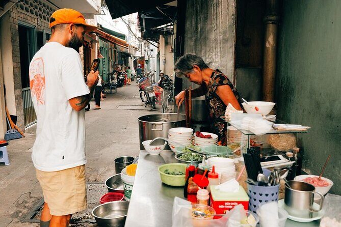 Early Riser Walk: Grandma Noodles, Cafe, Exotic Fruits & History - Ban Cờ Market and the everyday streets you usually skip