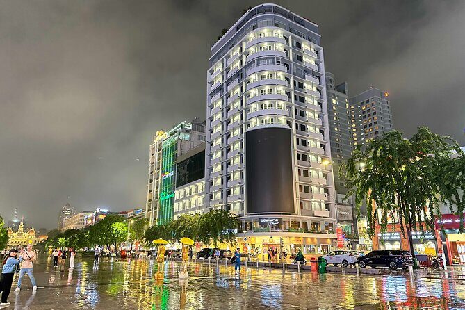 [Free E-sim] Evening Walking Tour in Saigon - Entering the night: why Bitexco works as your starting point
