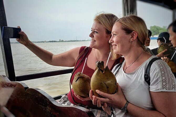 From Ho Chi Minh City: Discover Mekong Delta & Coconut Village - Coconut candy, fruit, and Southern folk music you can actually enjoy
