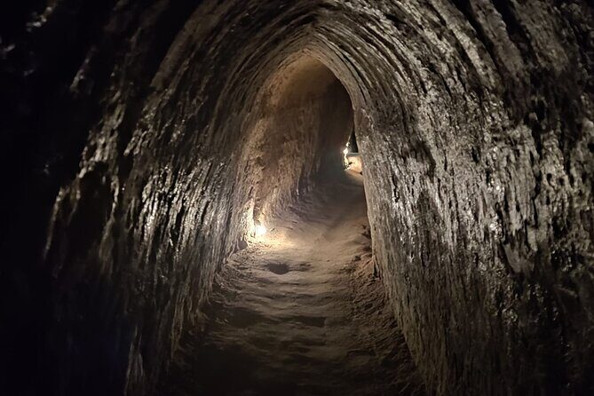From Ho Chi Minh: Cu Chi Tunnels Half-Day History Tour with Guide - Inside the tunnels: documentary, command center, fighting bunkers