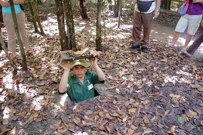 Full day Cu Chi Tunnels And Mekong Delta Guided Tour - Cu Chi Tunnels: the intro video, then the living-and-fighting layout