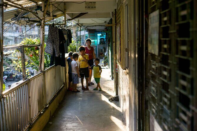 Half Day - Saigon Off-the-Beaten-Path - City Cycling Tour - District 10: Umbrella Market and the 1968 apartment complex