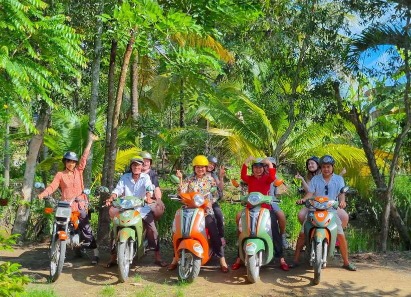 Ho Chi Minh City: Mekong Delta Day Trip with Lunch & Drinks - Kayak or rowing on coconut canals, plus sugarcane juice and coconut candy