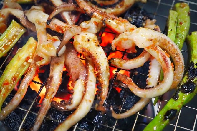 Ho Chi Minh City: Street Food & Sightseeing Tour with Local Guide - Ho Thi Ky Flower Market and Bánh tráng nướng for your first real snack hit