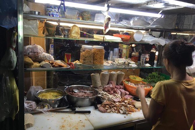 Ho Chi Minh City: Street Food Walking Tour with 12 Tastings - Safety and comfort: helmets, ponchos, and riding after dark