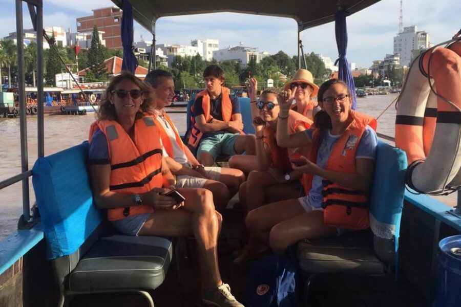 Ho Chi Minh Daily Tour: Full Day Mekong Delta (Private tour) - Village walking and rowing through coconut canals