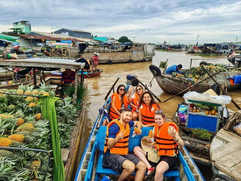 Ho Chi Minh: Group Cai Rang Floating Market 1 Day Tour - Can Tho arrival and the first look at Cai Rang Floating Market