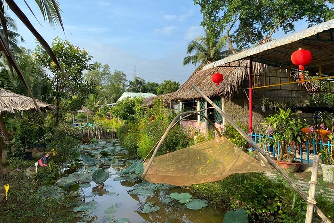 Mekong 2D1N SMALL GROUP Stay at Family Homestay WITH BBQ DINNER - Family homestay tiny garden: fishing, sunset rice fields, and BBQ dinner