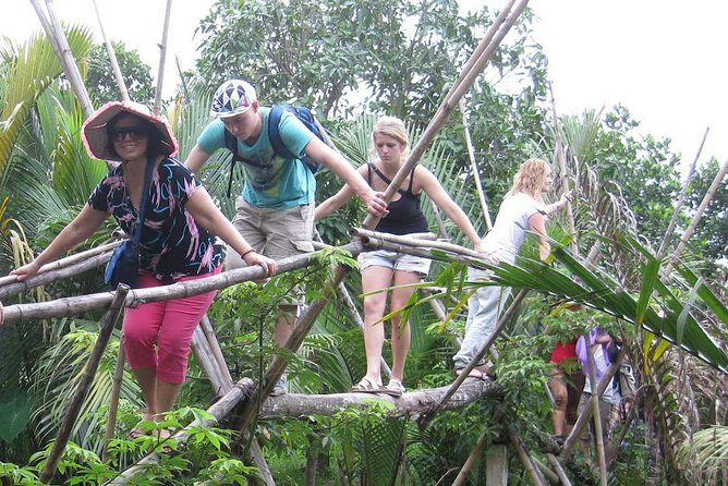 Mekong Delta Boat Tour - Hand-rowed sampan through palm-fringed waterways: personal, but check your expectations