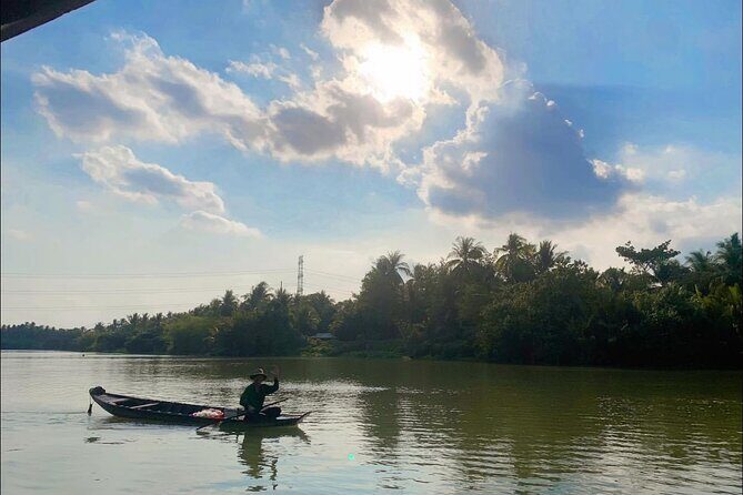 Mekong Delta Full-Day Tour - Island village stops: fruit tasting, craft watching, and coconut juice