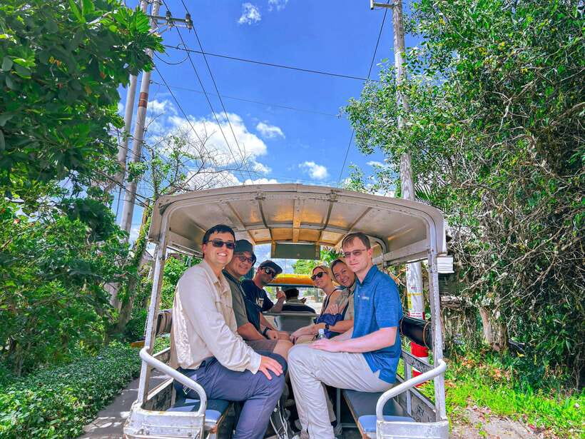 Mekong Delta 'Lesser-Known' My Tho & Ben Tre 1-Day Tour - Three boats on the Mekong: big boat, rowing boat, motor boat