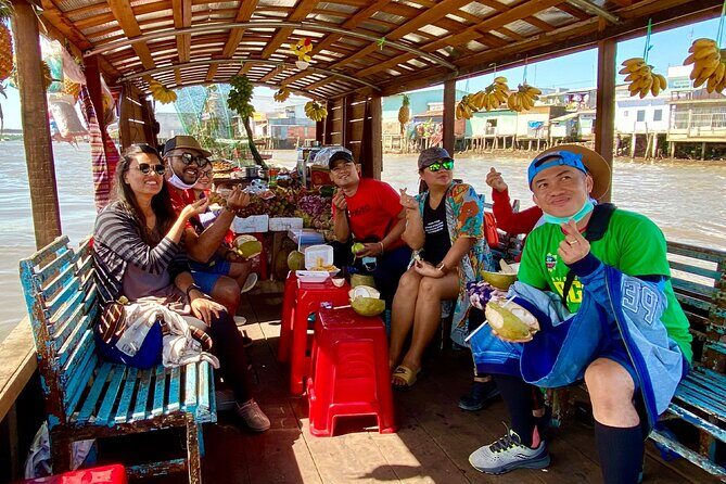 MEKONG DELTA TOUR TO FLOATING MARKET CAI BE from HCM city - Sampan Ride Through Small Canals: Wooden Homes, Palm Leaf Roofs, and Quiet Views
