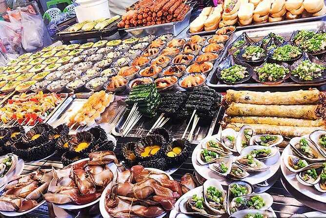 Phu Quoc City - Local Street Food Tour By Night - Dinh Cau Rock and temple: religion, harbor views, and a quick reset