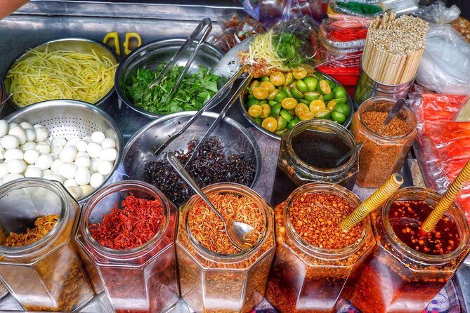 Private Saigon Street Food Tour with Motorbike - Scooter safety and gear: helmets, rain ponchos, and fuel
