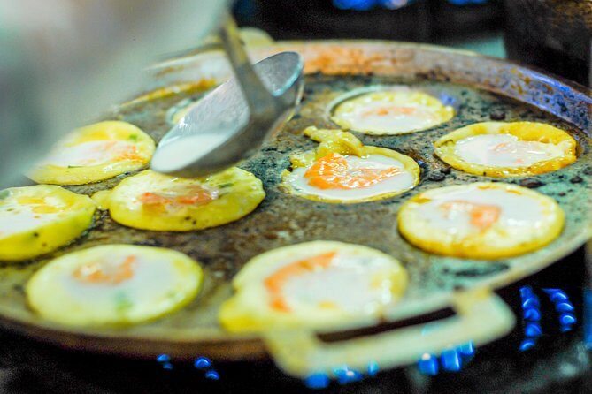 Private Street Food Motorbike Tour in Ho Chi Minh City - District 5 Coconut Treat Stop: Cooling Desserts, Real Ingredients