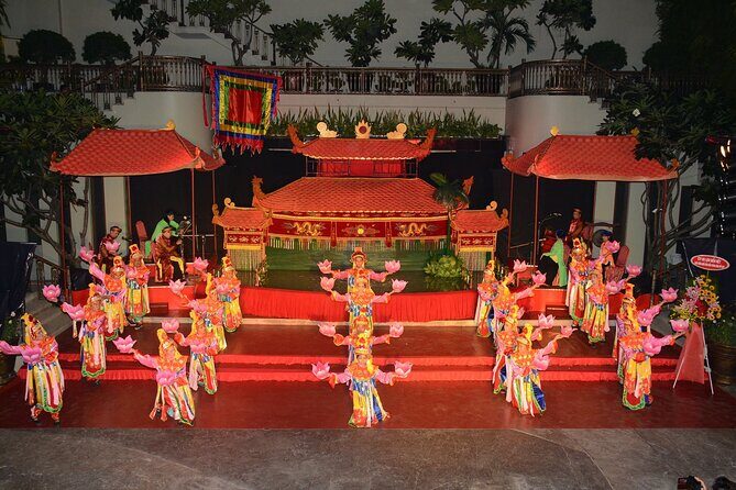 Private Tour Water Puppet Show And Cruise Tour On Saigon River - Saigon River dinner cruise: food, music, and city lights after dark