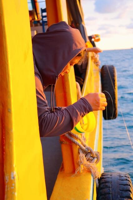 RedRiverTours - Enjoying Sunset & Night Squid Fishing - Dinner on board: what you eat and why it feels special