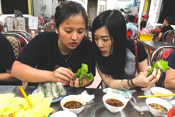 Saigon Afternoon Unseen Street Food by Scooter |Opt: Ao Dai Rider - Banh Xeo and Wild Vegetables: The Meal Moment That Anchors the Tour