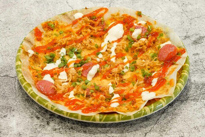 Saigon By Night and Vietnam Local Food on Motorbike - Stop 5: Ho Thi Ky Flower Market and Grilled Rice-Paper Pizza