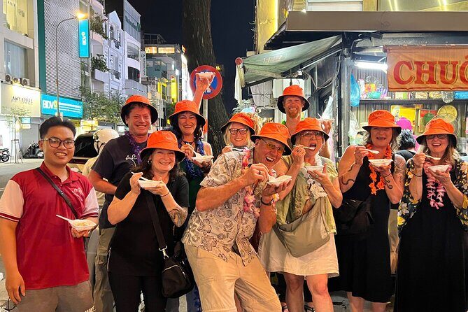 Saigon By Night: Authentic Street Food Scooter Adventure - Where It Starts: District 1 Meet-Up, Helmet Time, and Quick Ride Prep