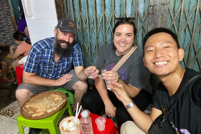 Saigon by Night: Private Street Food Walk You Can’t Miss - Vietnamese Pizza, a Seafood Challenge, and What to Expect When the Pace Turns Adventurous