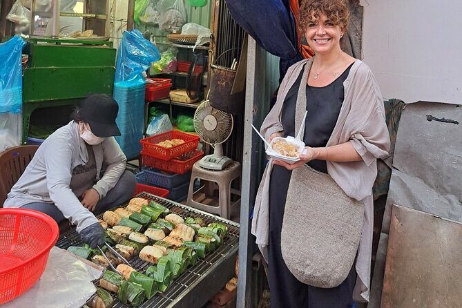 Saigon Food Tour by Scooter with Eleven Tastings - District 10 cooking class: mini sizzling savory pancakes and betel leaf beef
