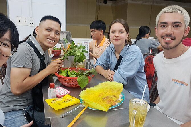 Saigon Food Tour by Scooter with Eleven Tastings - Ho Thi Ky Flower Market stop: Vietnamese pizza, snails, and grilled rice paper cake