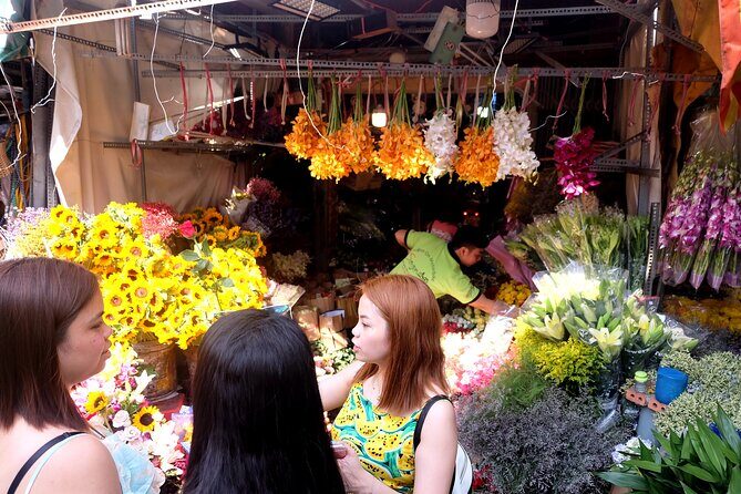 Saigon Morning Excursion by Scooter - Passing ornamental fish street and Medicine Street