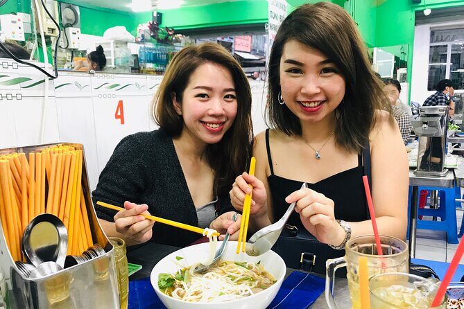 Saigon Night Scooter Experience And Local Food - Flower market views and District 7 nights for photos and breathing space
