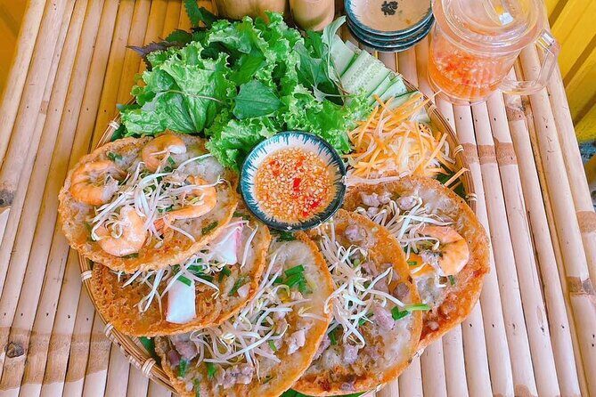 Saigon Scooter Adventure - City Sights & Street Food Tour - Ho Thi Ky Flower Market and a Vintage Nước Mía Break