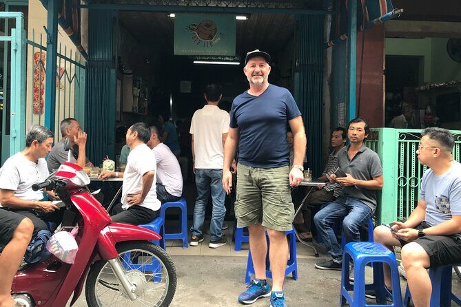 Saigon Slum tour and Saigon Chillspots by motorbike/ Aodai rider - Flower market lotus craft: culture, color, and local daily life