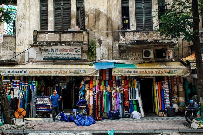 Saigon Street Photography Experience - French-colonial and war-era apartment buildings: architecture as a living photo story