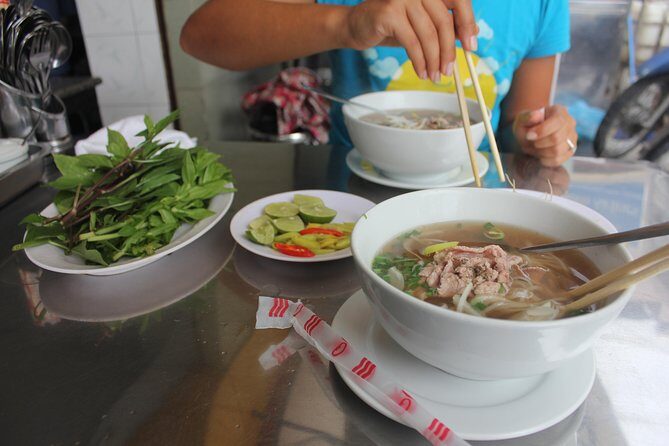 Small-group Street Food Lover by Motorbike (04 hours) - Half-day motorbike street food in Ho Chi Minh City: how the experience flows