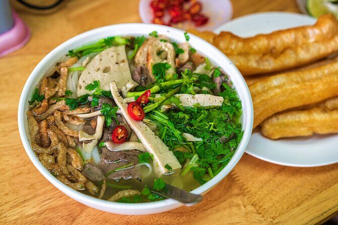 The Coolest Vegan Food Tour by Motorbike in Ho Chi Minh City - Meeting near the Opera House: easy start, simple finish