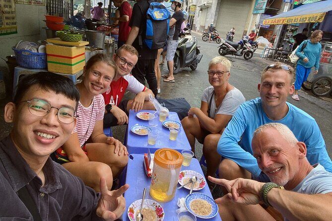 The Coolest Vegan Food Tour by Motorbike in Ho Chi Minh City - Nguyen Thien Thuat apartment buildings: vegan Bun Bo Hue in a real wartime setting