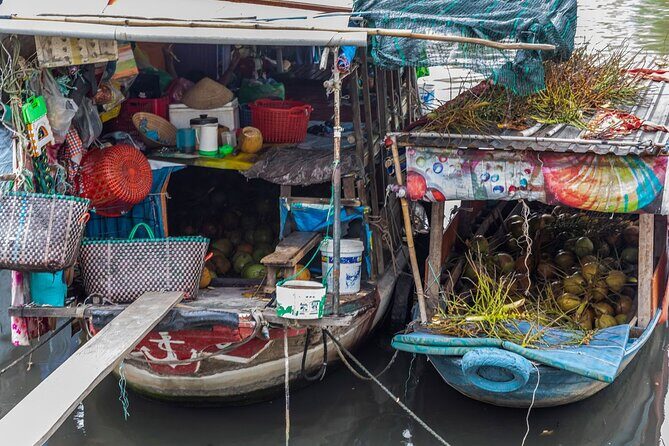The River's Edge Photo Tour - District 7 canal scenes: tugboats, coconuts, and working river life